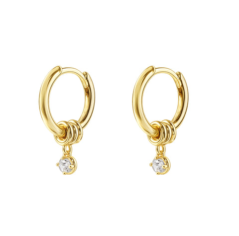Gold huggy earring with cubic zirconia.