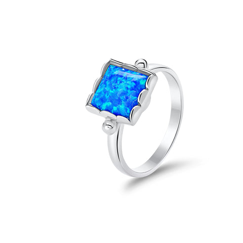 Sterling silver synthetic blue opal ring
